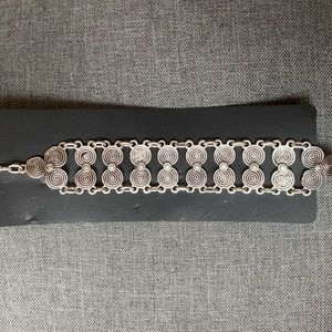 Handmade antique silver circle bracelet. Adjustable link, lobster claw closure.